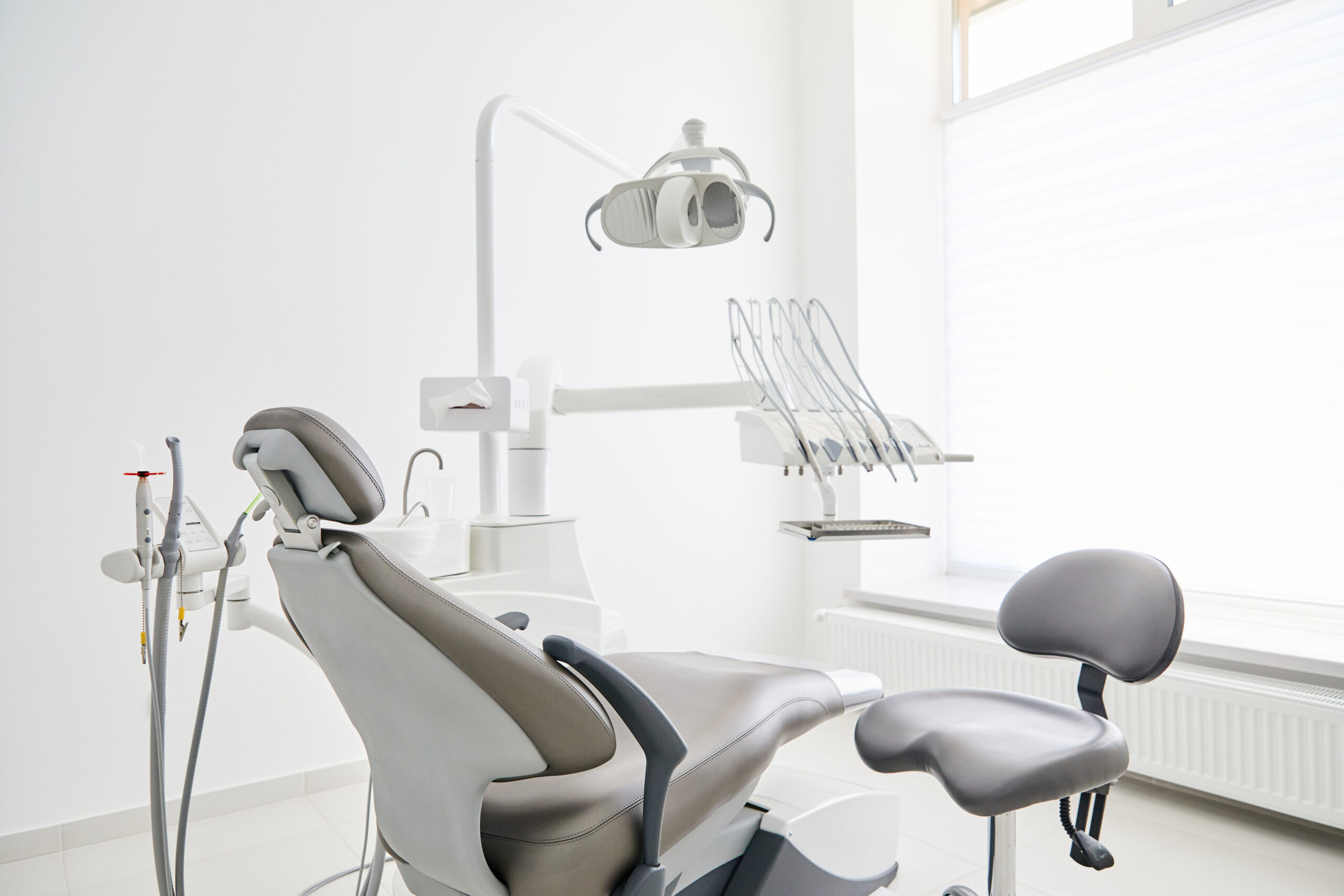 Dentist's office interior with modern chair and special dentisd equipment